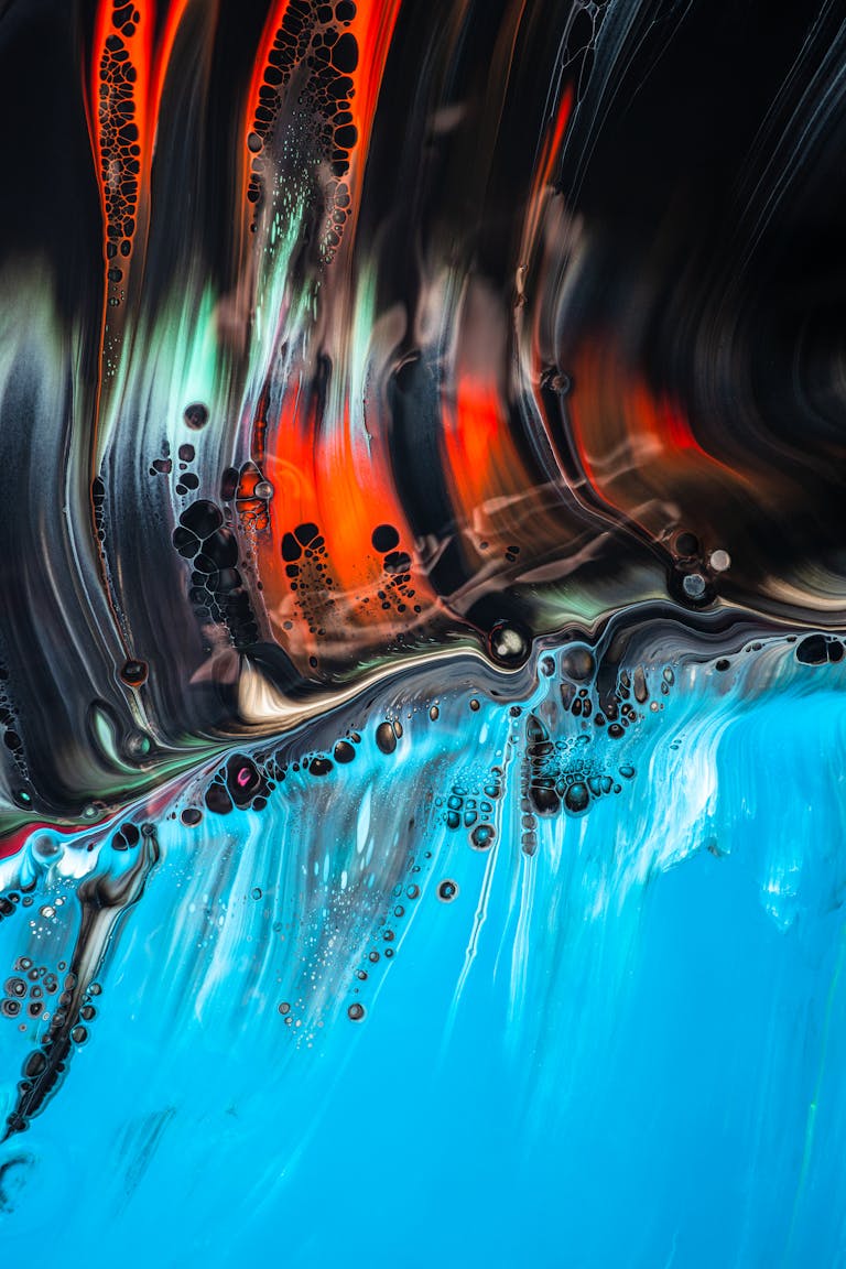 Dynamic abstract art piece with vibrant colors and fluid acrylic paint textures.